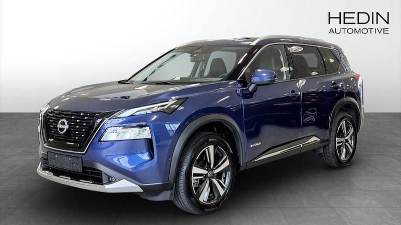 Blå Begagnad 2024 Nissan X-Trail Pack SUV | 493 400 kr (Marknadspris) - Bild 1/4