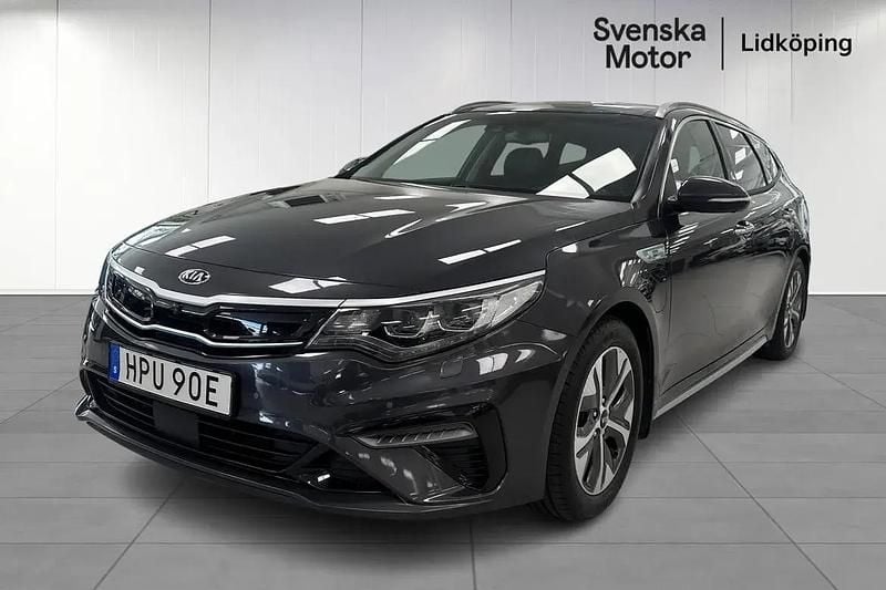Grå Begagnad 2019 Kia Optima Hybrid 2 Sedan | 194 900 kr (Marknadspris) - Bild 1/4