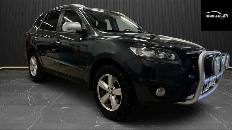 Grå Begagnad 2011 Hyundai Santa Fe SUV | 59 900 kr (Bra pris) - Bild 1/4