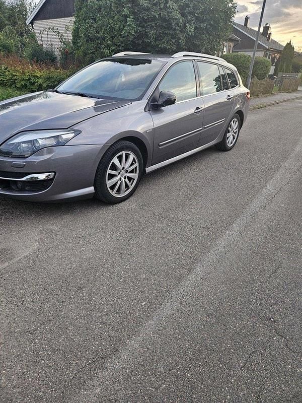 Grå Begagnad 2012 Renault Laguna III Kombi | 57 000 kr - Bild 1/4