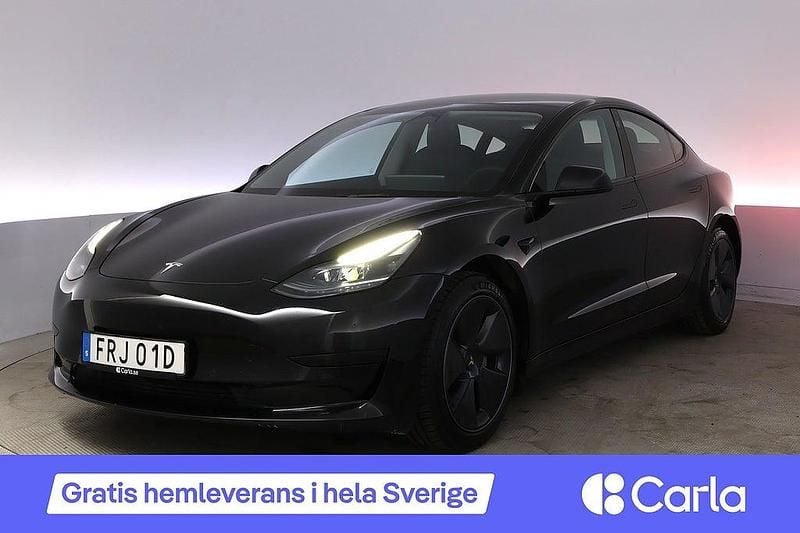 Svart Begagnad 2022 Tesla Model 3 Standard Range Sedan | 287 990 kr (Bra pris) - Bild 1/4