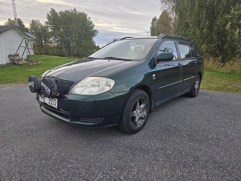 Grön Begagnad 2002 Toyota Corolla Kombi | 18 000 kr (Marknadspris) - Bild 1/4