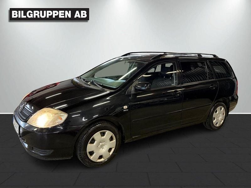 Svart Begagnad 2002 Toyota Corolla Kombi | 29 900 kr (Marknadspris) - Bild 1/4