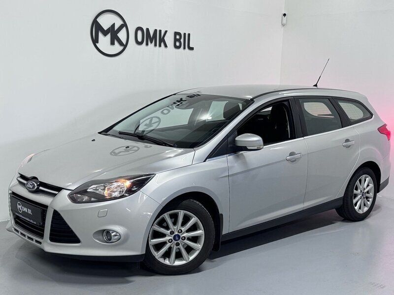 Grå Begagnad 2014 Ford Focus Titanium Kombi | 59 900 kr (Marknadspris) - Bild 1/4
