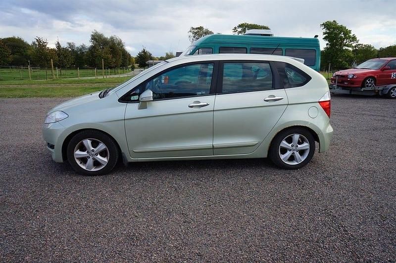 Begagnad Honda FR-V 150 HK (110 kW) 2006 Ljusgrön (grön metallic) Minibuss