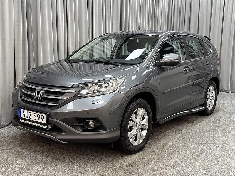 Mörkgrå Begagnad 2014 Honda CR-V Elegance SUV | 159 900 kr (Marknadspris) - Bild 1/4