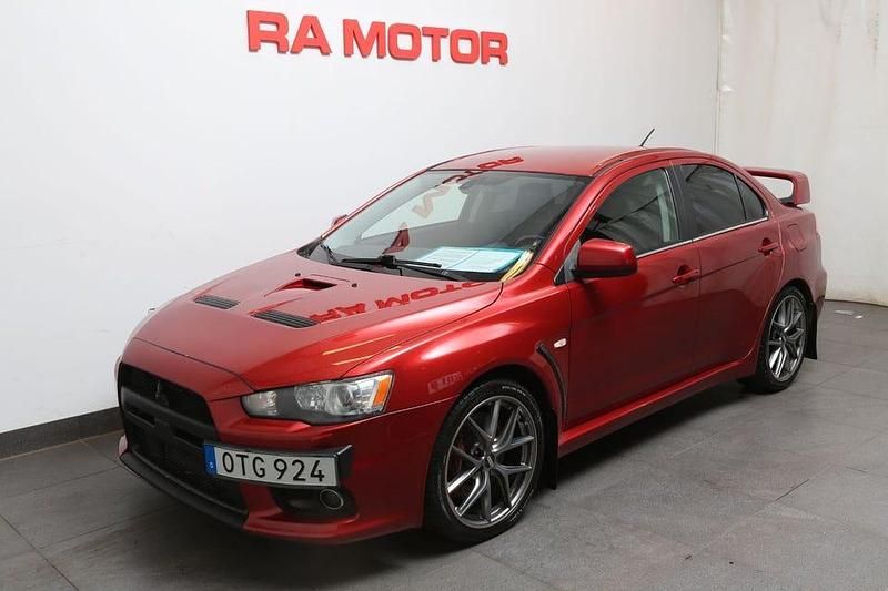 Mörkröd Begagnad 2008 Mitsubishi Lancer Sedan | 239 900 kr - Bild 1/4