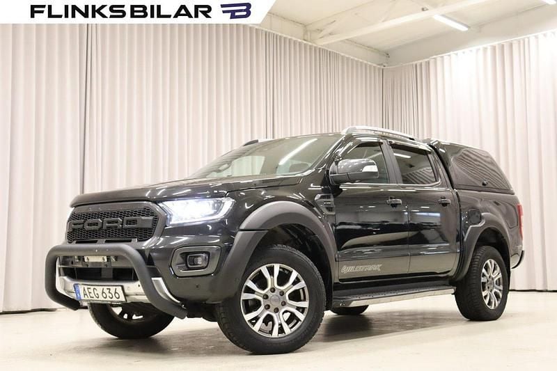 Svart (svart metallic) Begagnad 2022 Ford Ranger Wildtrack Pickup | 468 750 kr (Marknadspris) - Bild 1/4