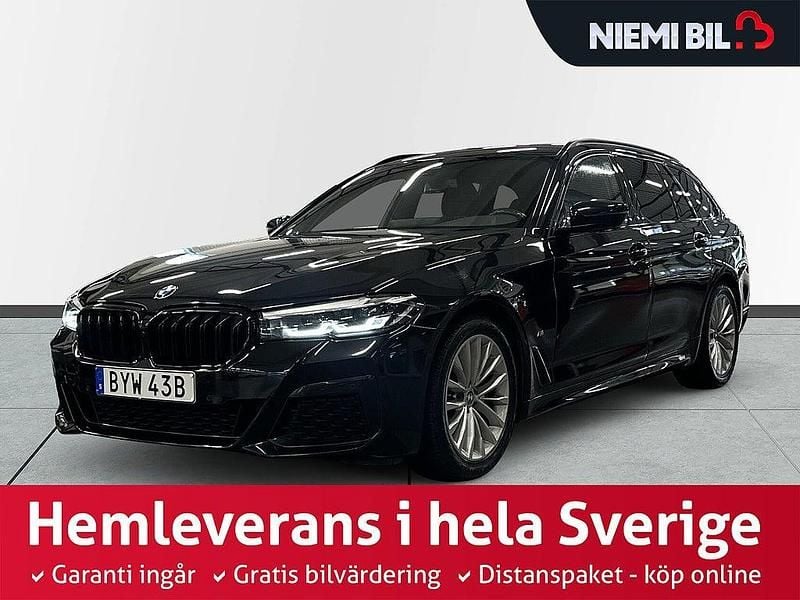 Svart Begagnad 2021 BMW 520 M Sport Kombi | 369 900 kr (Marknadspris) - Bild 1/3