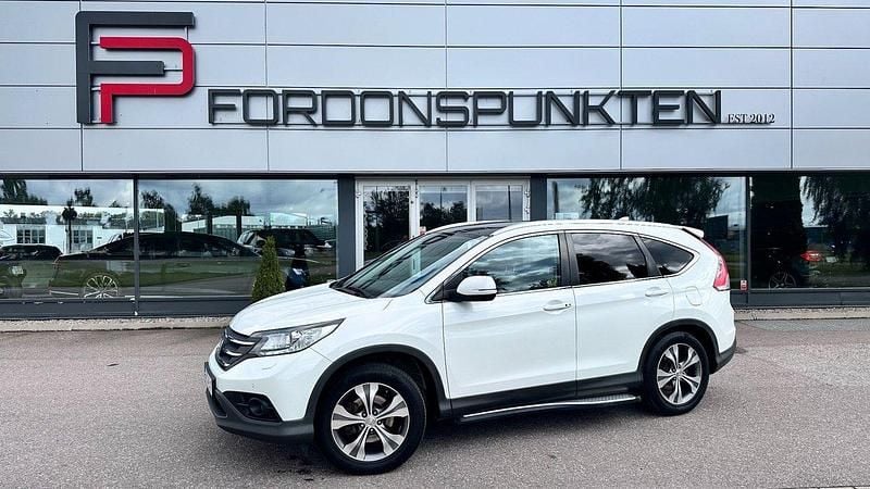 Vit Begagnad 2014 Honda CR-V Executive SUV | 169 000 kr (Marknadspris) - Bild 1/4