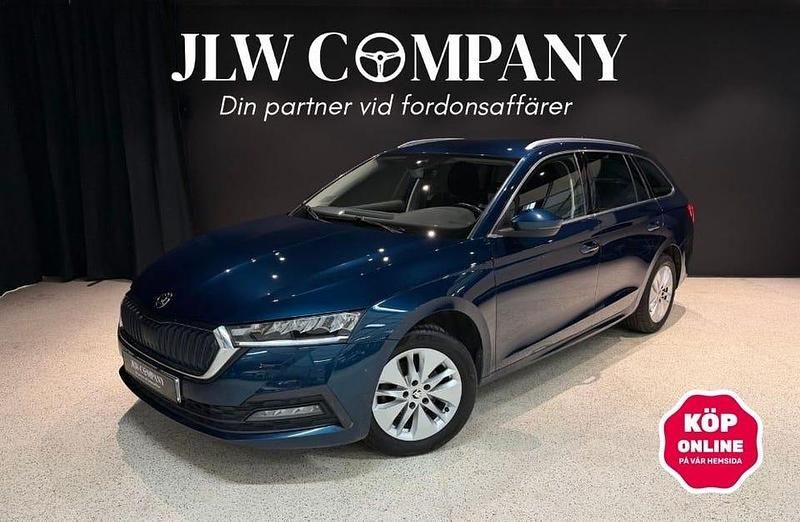 Lava blue metallic Begagnad 2021 Skoda Octavia Ambition Kombi | 198 000 kr (Marknadspris) - Bild 1/4