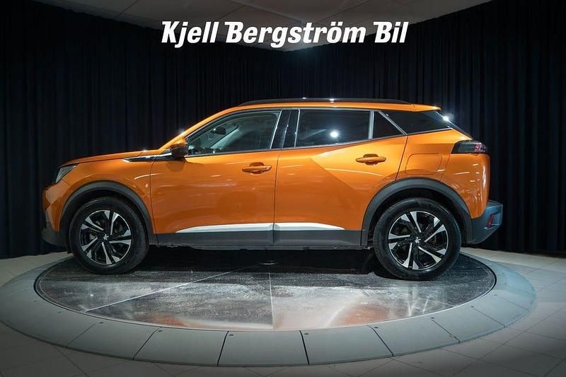 Begagnad Peugeot e-2008 100 kW (136 HK) 2021 Orange SUV
