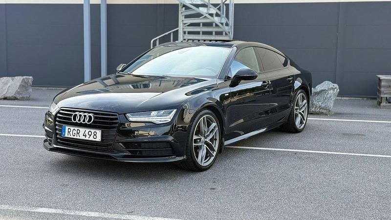 Svart Begagnad 2017 Audi A7 Sportback Ambition Halvkombi | 249 400 kr (Marknadspris) - Bild 1/4