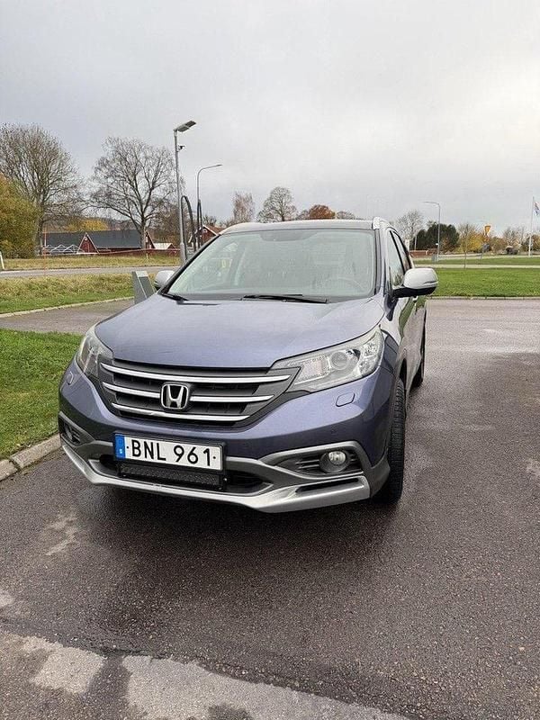 Blå Begagnad 2014 Honda CR-V Executive SUV | 130 000 kr (Bra pris) - Bild 1/4
