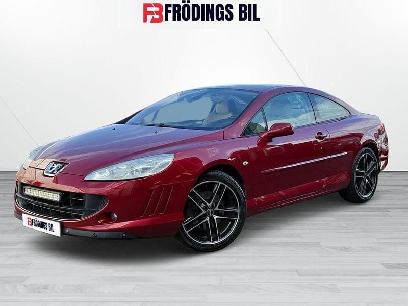 Mörkröd (röd) Begagnad 2006 Peugeot 407 Coupe Sportkupé | 39 900 kr - Bild 1/4