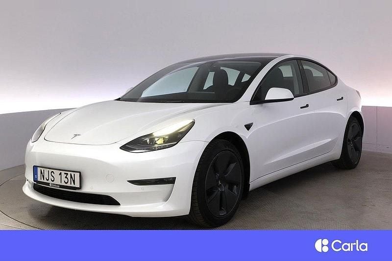 Vit Begagnad 2021 Tesla Model 3 Long Range Sedan | 329 900 kr (Marknadspris) - Bild 1/4