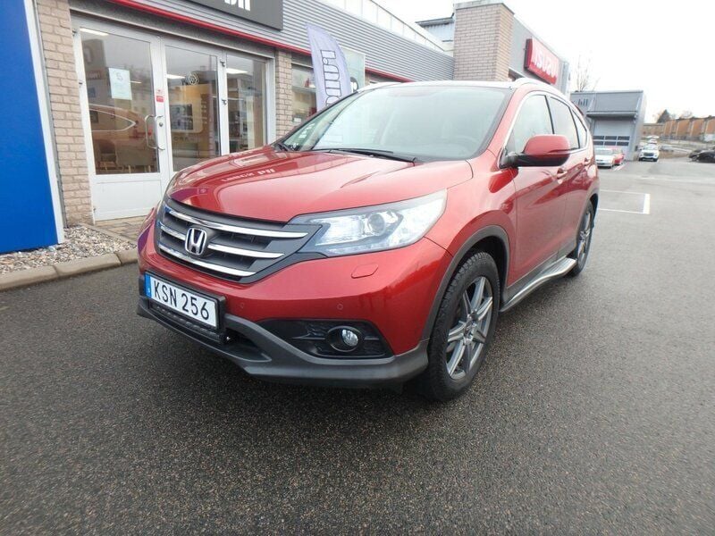 Röd Begagnad 2014 Honda CR-V Executive SUV | 182 500 kr (Marknadspris) - Bild 1/4