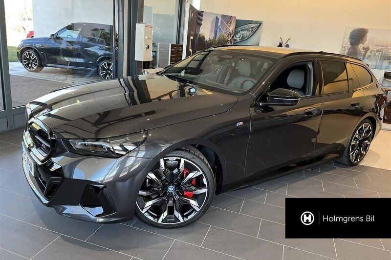 Grå/silver Ny 2024 BMW i5 M Sport Sedan | 1 370 800 kr - Bild 1/4