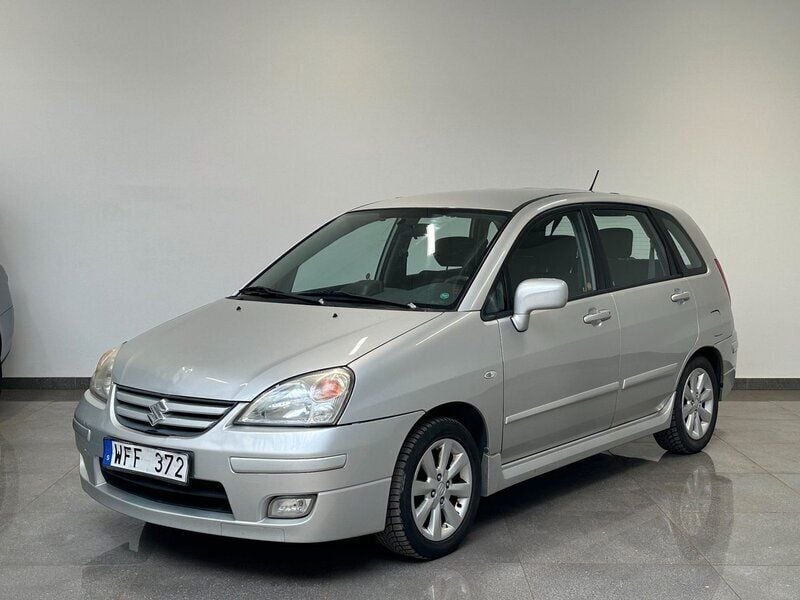 Silver Begagnad 2004 Suzuki Liana Halvkombi | 24 900 kr - Bild 1/4
