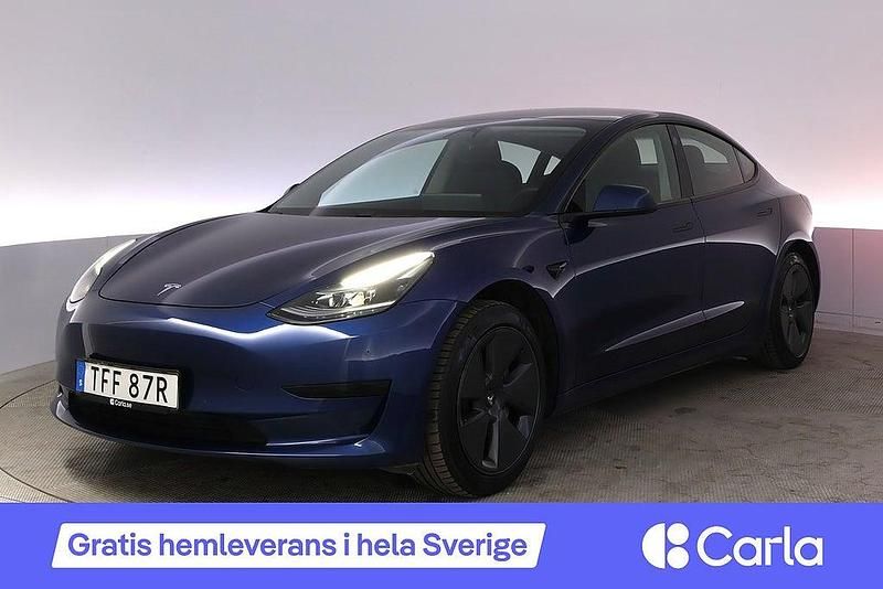 Blå Begagnad 2021 Tesla Model 3 Standard Range Plus Sedan | 289 900 kr (Marknadspris) - Bild 1/4
