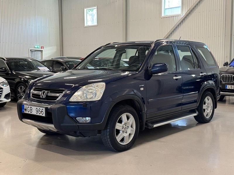 Mörkblå Begagnad 2004 Honda CR-V SUV | 59 900 kr (Dyr) - Bild 1/4