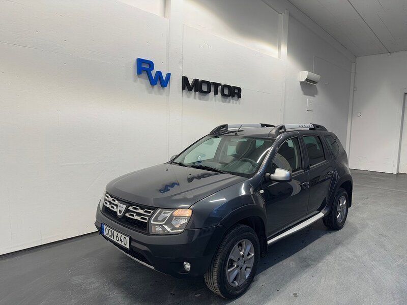 Mörkgrå (grå) Begagnad 2014 Dacia Duster SUV | 69 800 kr (Marknadspris) - Bild 1/4