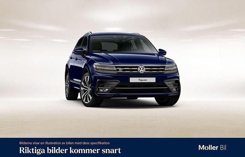 Mörkblå (atlantik blue metallic) Begagnad 2017 VW Tiguan R-line SUV | 269 900 kr (Lite dyr) - Bild 1/4