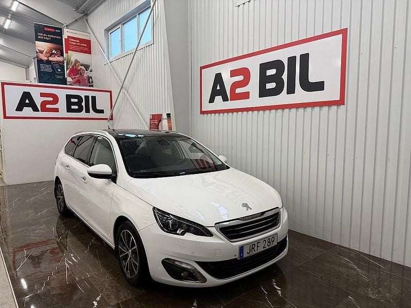 Vit Begagnad 2014 Peugeot 308 Allure Kombi | 69 900 kr (Marknadspris) - Bild 1/4
