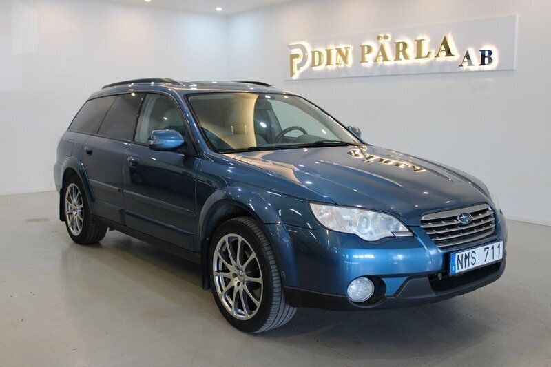 Mörkblå (blå) Begagnad 2007 Subaru Outback SUV | 79 900 kr (Marknadspris) - Bild 1/4