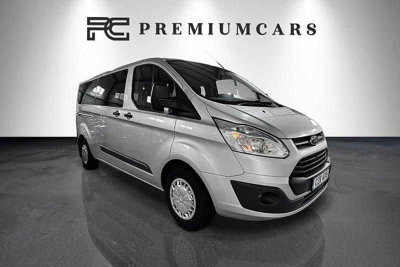 Grå Begagnad 2014 Ford Transit Custom Kombi | 169 900 kr (Marknadspris) - Bild 1/4
