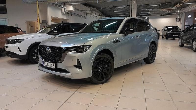 Grå Ny 2025 Mazda CX-60 Homura-Line SUV | 645 400 kr (Dyr) - Bild 1/4