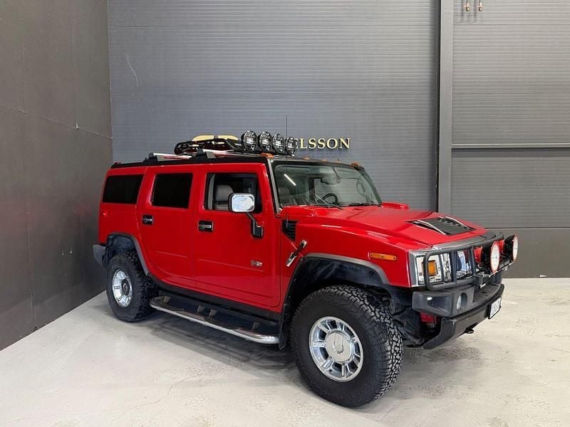 Röd Begagnad 2004 Hummer H2 SUV | 189 800 kr - Bild 1/4