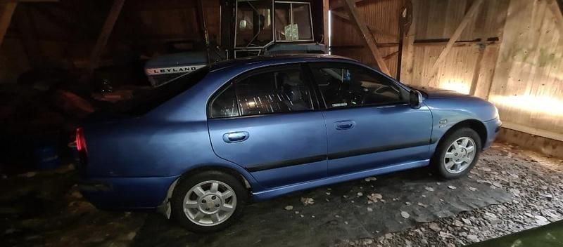 Blå Begagnad 2000 Mitsubishi Carisma Elegance Halvkombi | 24 000 kr - Bild 1/1