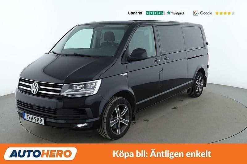 Svart Begagnad 2018 VW Caravelle Minibuss | 291 000 kr (Marknadspris) - Bild 1/4