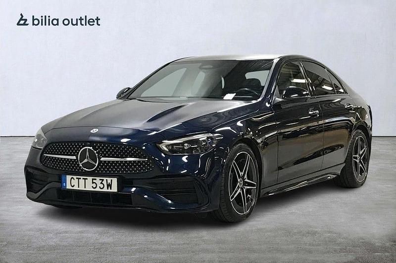 Mörkblå Begagnad 2021 Mercedes C300 AMG Sedan | 439 900 kr - Bild 1/4