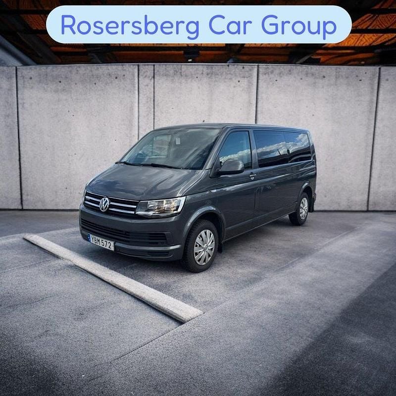 Grå Begagnad 2016 VW Caravelle Comfortline Minibuss | 324 875 kr (Dyr) - Bild 1/4
