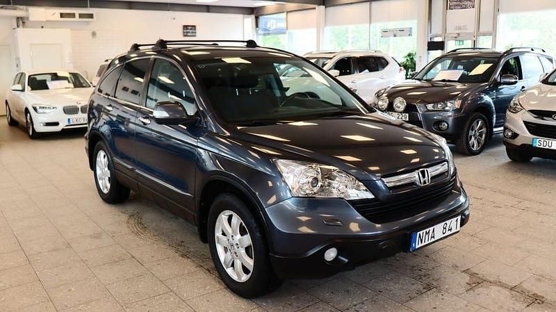 Mörkgrå Begagnad 2007 Honda CR-V SUV | 49 900 kr (Marknadspris) - Bild 1/4