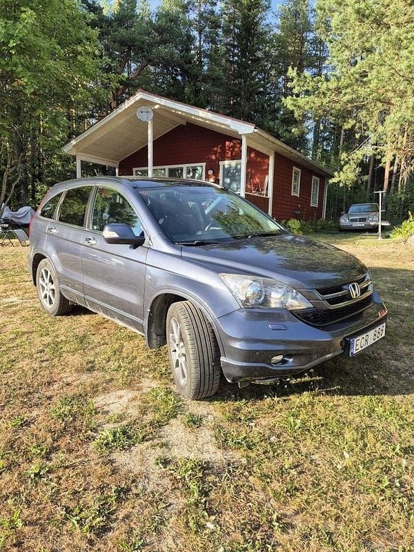 Grå Begagnad 2012 Honda CR-V Executive SUV | 110 000 kr (Bra pris) - Bild 1/1