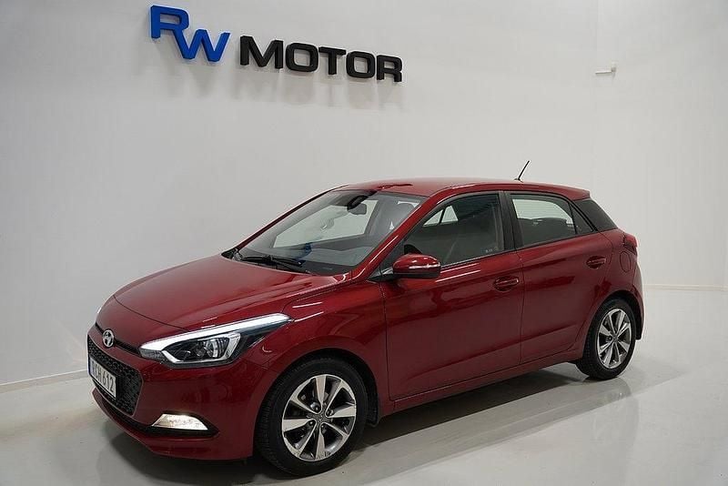 Röd Begagnad 2017 Hyundai i20 Premium Halvkombi | 159 800 kr (Marknadspris) - Bild 1/4