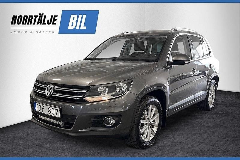 Mörkgrå (grå) Begagnad 2013 VW Tiguan SUV | 114 900 kr (Marknadspris) - Bild 1/4