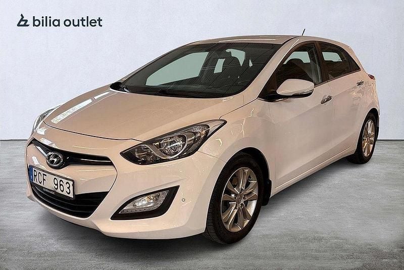 Vit Begagnad 2013 Hyundai i30 Premium Halvkombi | 104 900 kr (Marknadspris) - Bild 1/4