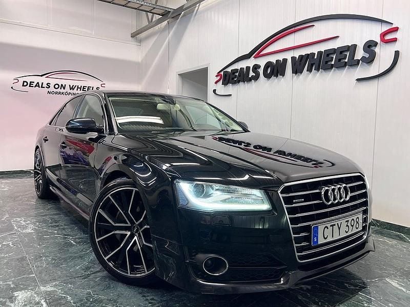 Svart Begagnad 2016 Audi A8 Comfort Sedan | 274 900 kr (Marknadspris) - Bild 1/4