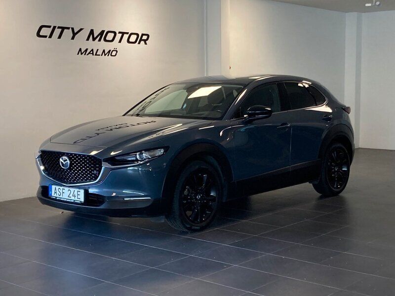 Grå Begagnad 2022 Mazda CX-30 Homura-Line SUV | 267 900 kr (Marknadspris) - Bild 1/4