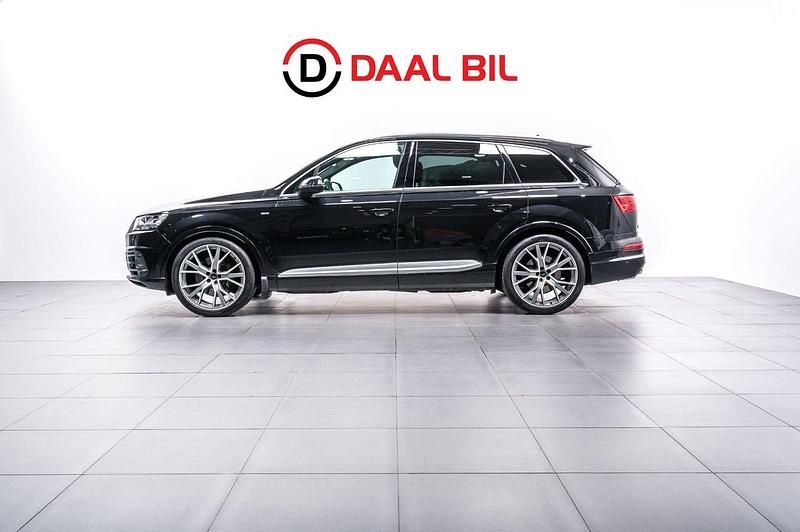 Svart Begagnad 2019 Audi Q7 S-Line SUV | 459 700 kr (Marknadspris) - Bild 1/4