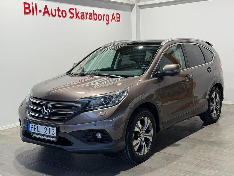 Ljusbrun Begagnad 2014 Honda CR-V Executive SUV | 139 500 kr (Marknadspris) - Bild 1/4