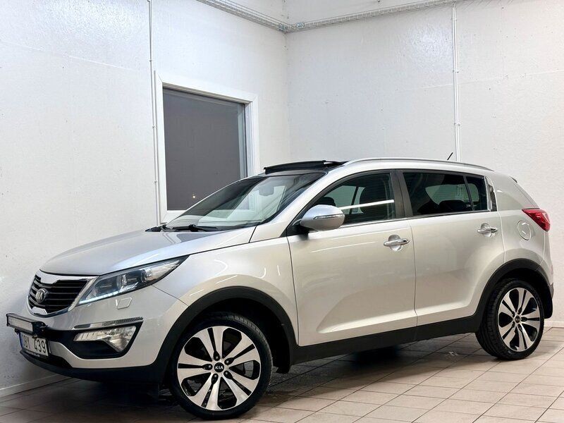 Grå Begagnad 2013 Kia Sportage SUV | 84 900 kr (Marknadspris) - Bild 1/4