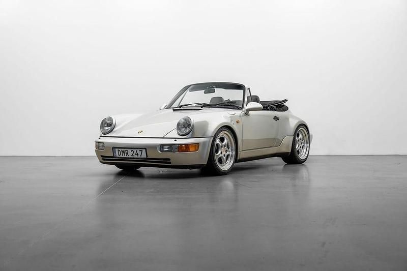Zermatt silver metallic / svart top Begagnad 1992 Porsche 911 Carrera Cab | 1 279 000 kr - Bild 1/4