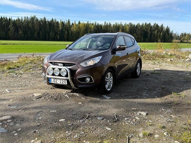 Brun Begagnad 2011 Hyundai ix35 SUV | 79 500 kr (Marknadspris) - Bild 1/4
