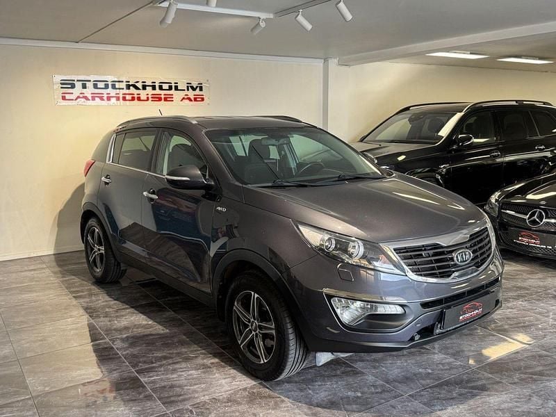 Mörkgrå Begagnad 2011 Kia Sportage Comfort SUV | 99 900 kr (Marknadspris) - Bild 1/4
