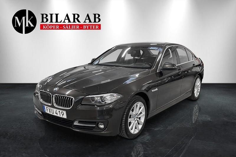 Brun Begagnad 2015 BMW 520 Sedan | 165 000 kr (Marknadspris) - Bild 1/4